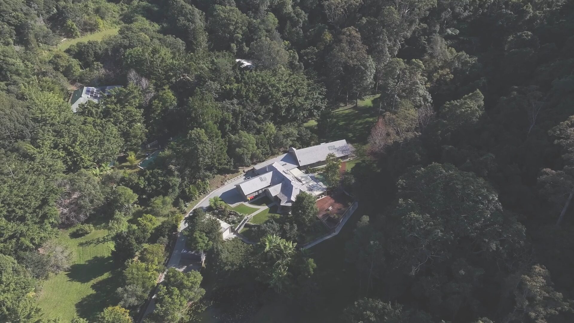 Aerial drone view of Whispering Pines estate